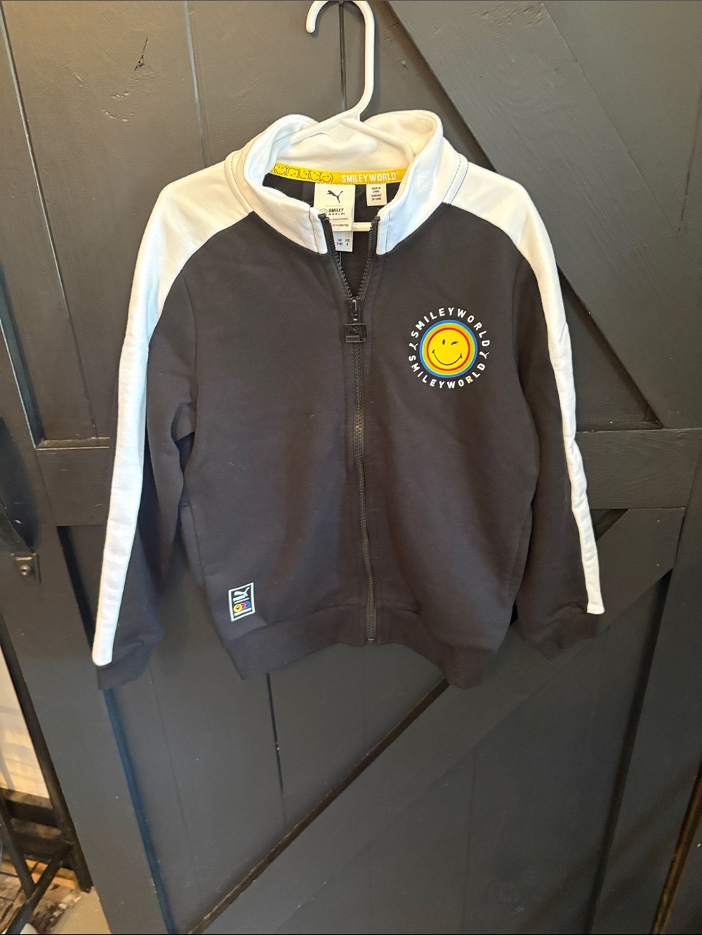 Puma Black Zip-Up Hoodie with White Sleeve Stripes and Yellow Smiley Patch